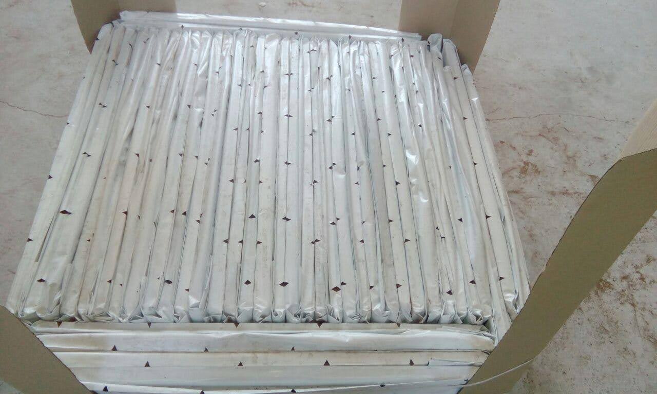 Coir Pith Blocks Stacked in Warehouse