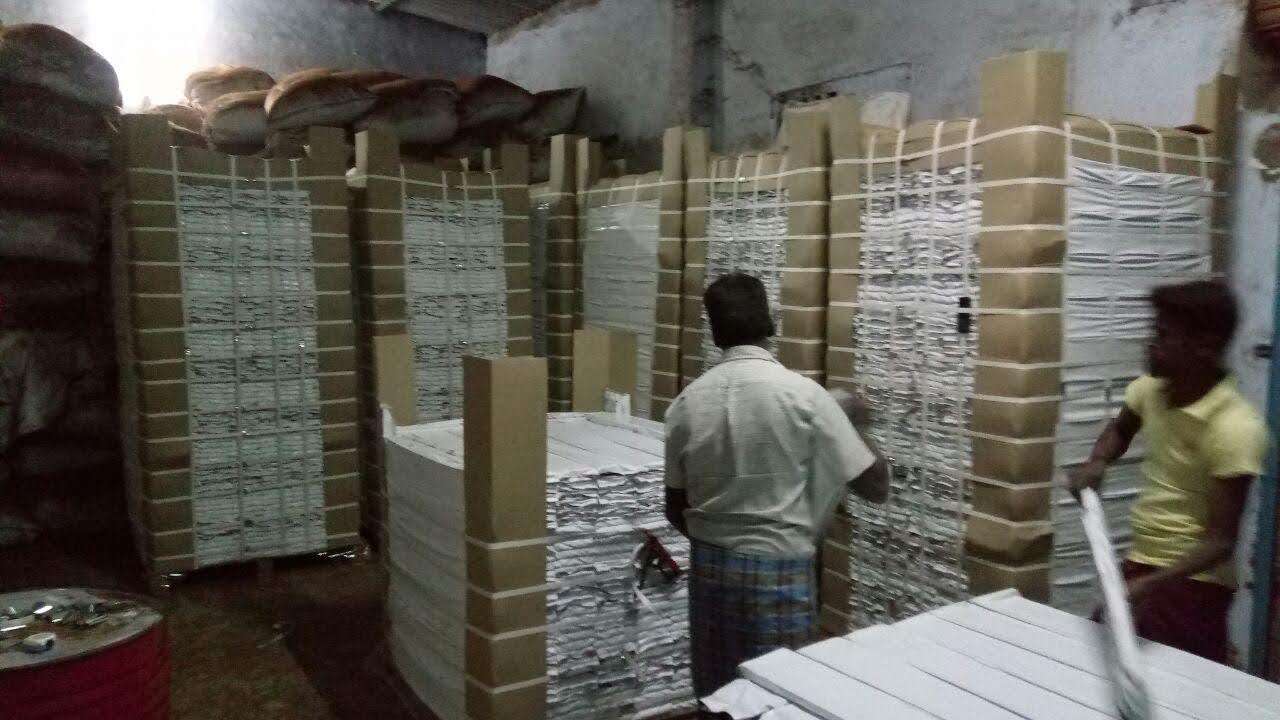 Coir Pith Blocks Stacked in Warehouse