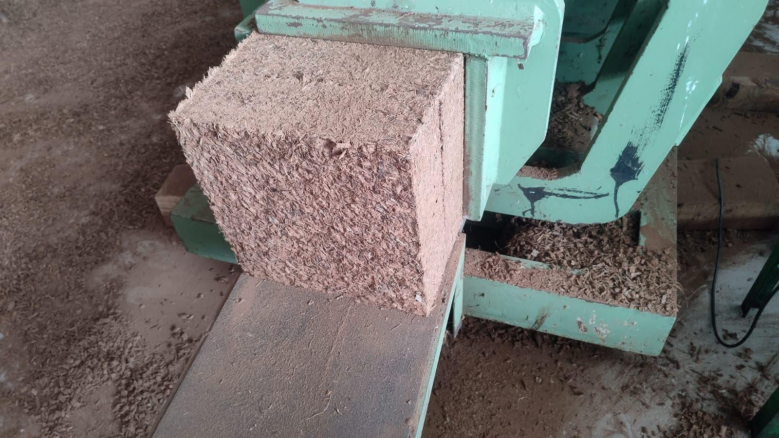 Coir Pith Blocks Stacked in Warehouse